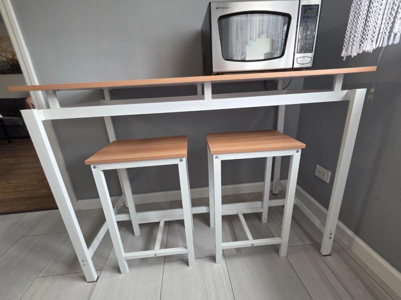 For sale: kitchen set: table and two stools, like new!